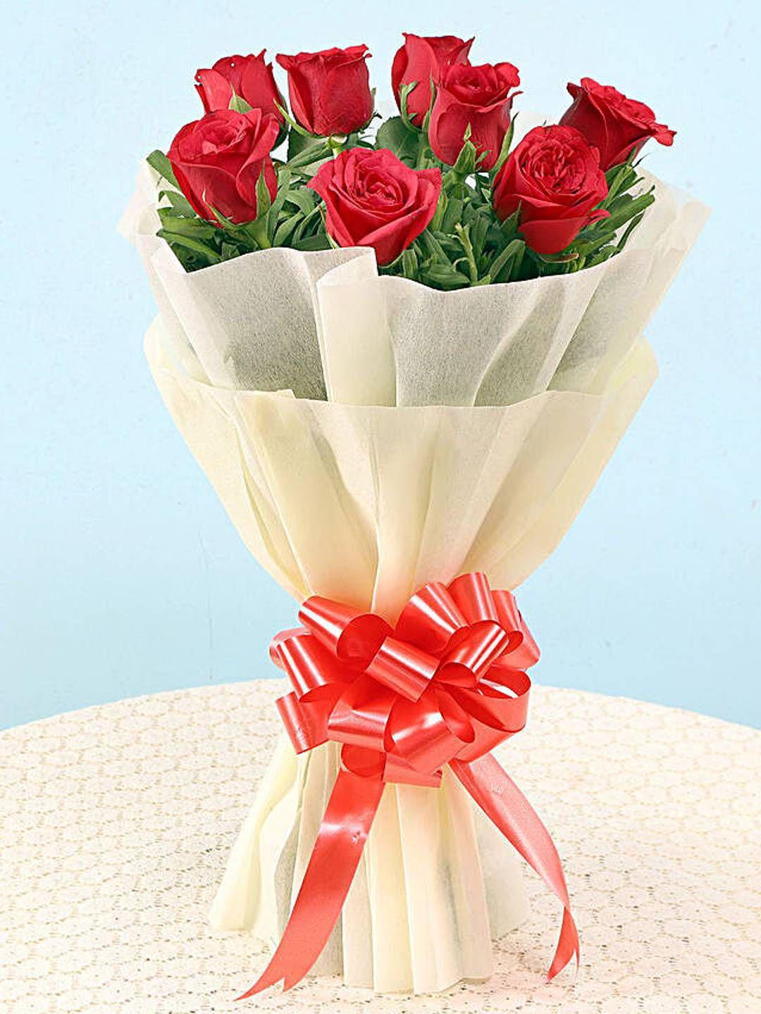 Buy fnp Red & Green 8 Pieces Graceful Red Roses - Fresh Flowers