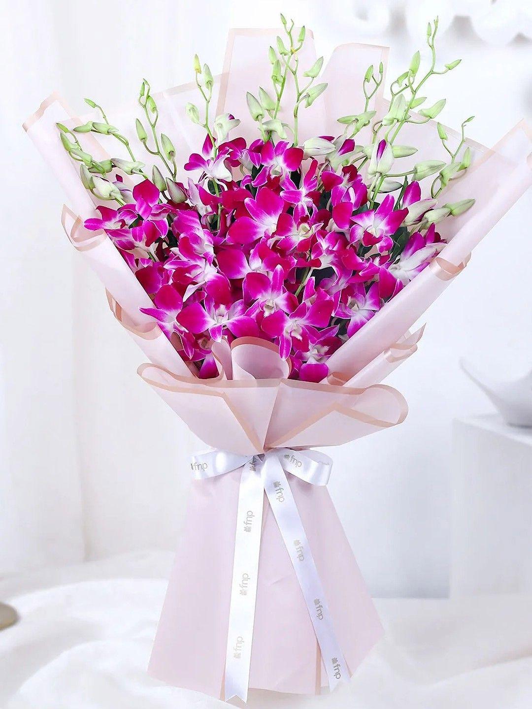 Buy fnp Purple & Green10Pieces Orchids Fresh Flowers Bouquet