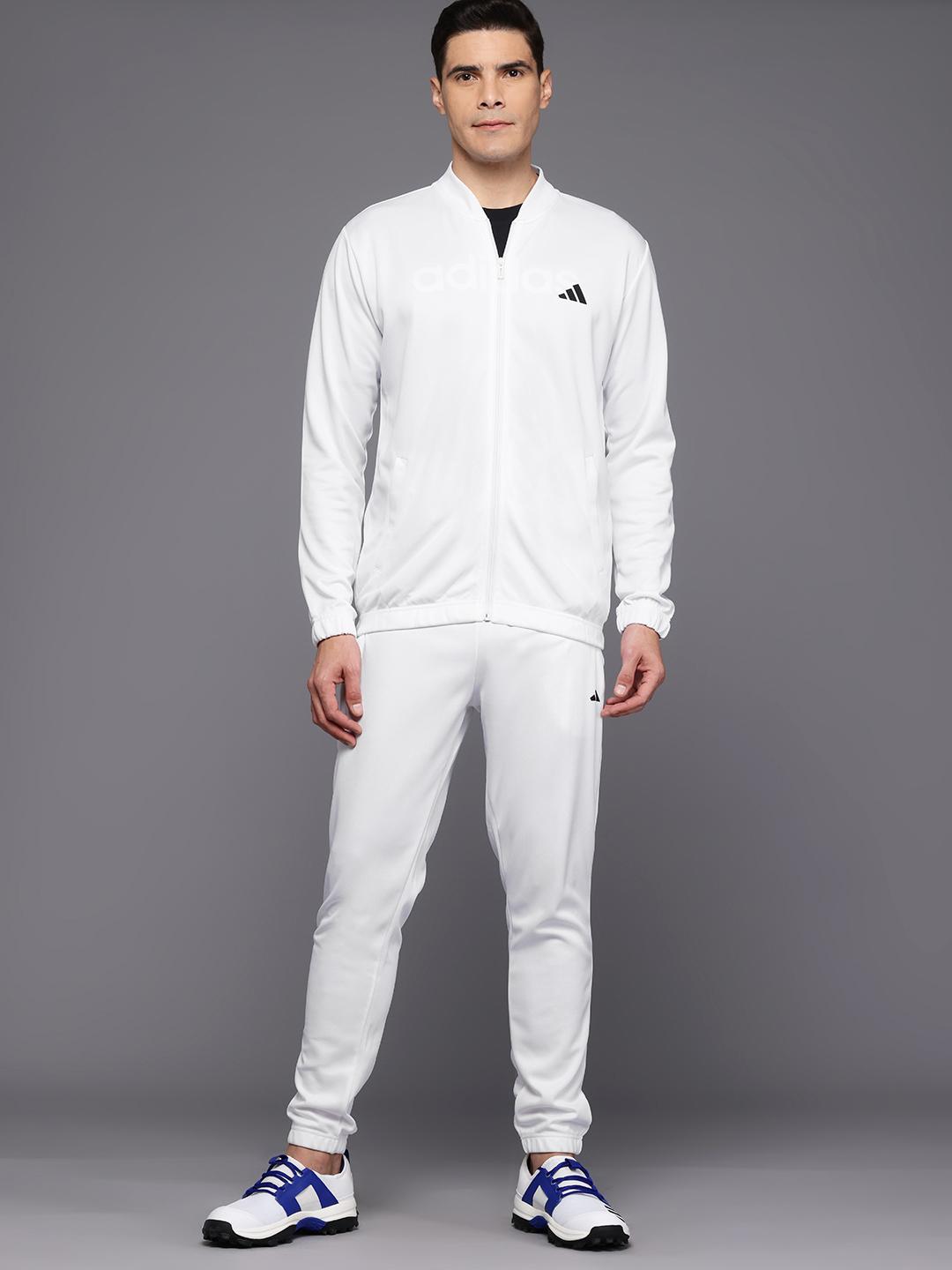 all white adidas track suit