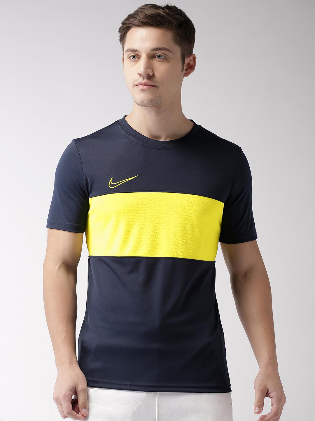 yellow and navy blue nike shirt