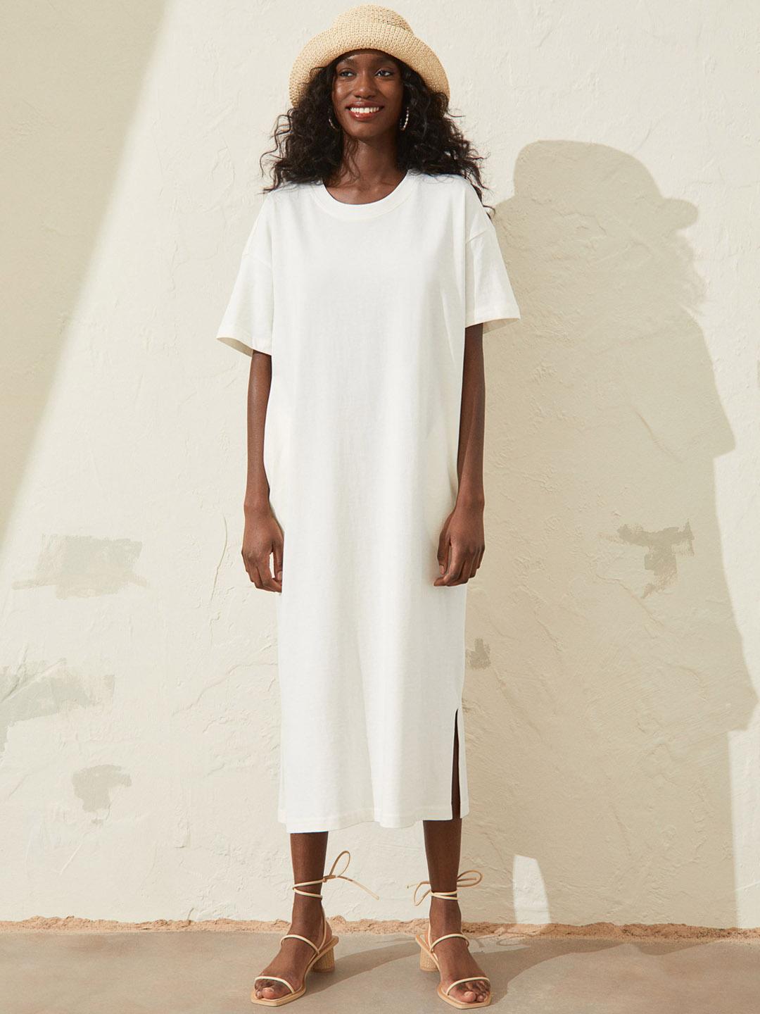 h&m calf length shirt dress H&M TEXTURED JERSEY DRESS DESCRIPTION & FIT Calf-length dress in textured  jersey with a round neckline and short sleeves. Tapered section at the  waist for a flattering silhouette