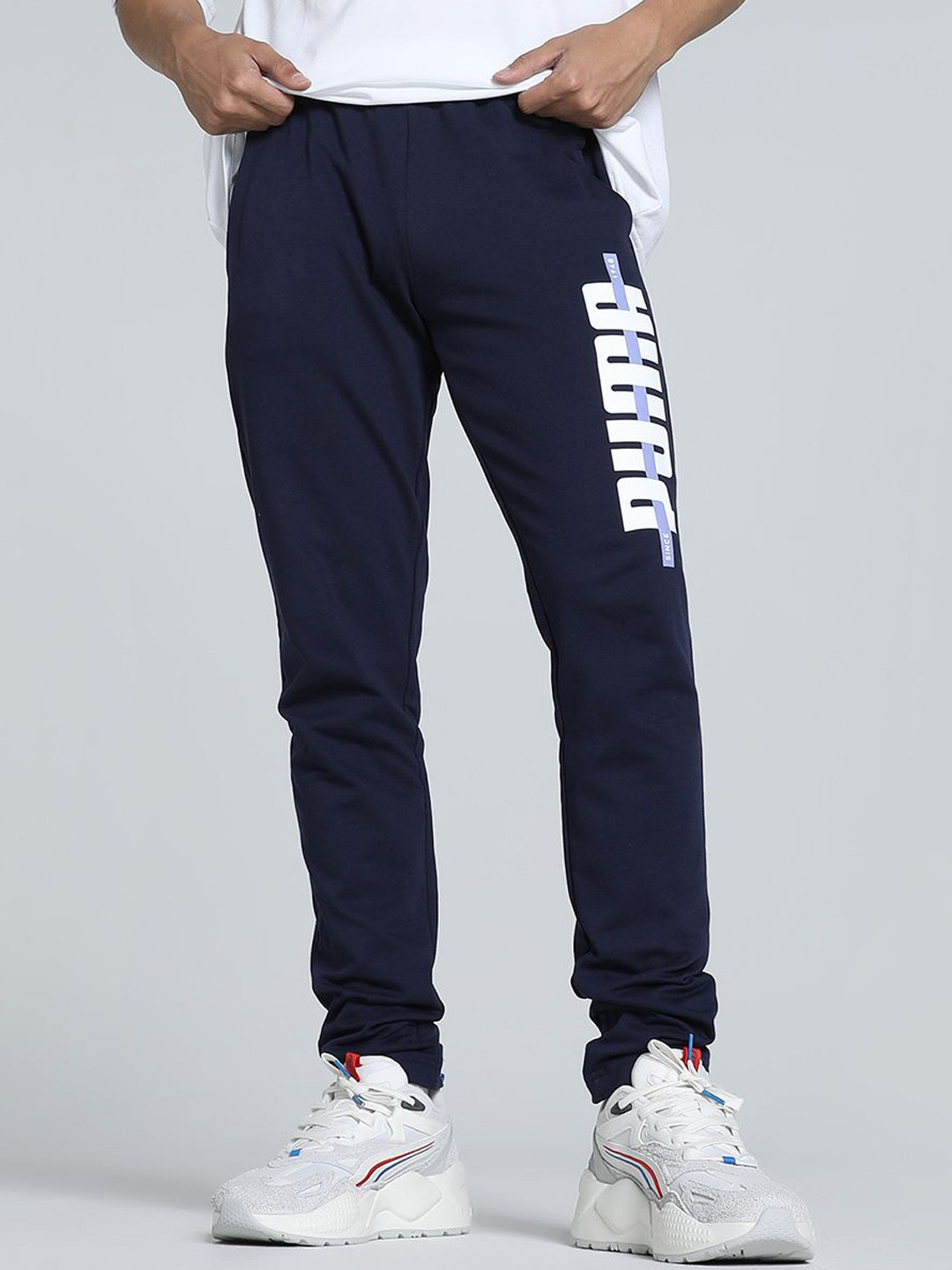 Puma Men Stylized Stripe Slim Fit Mid Rise Cotton Track Pants