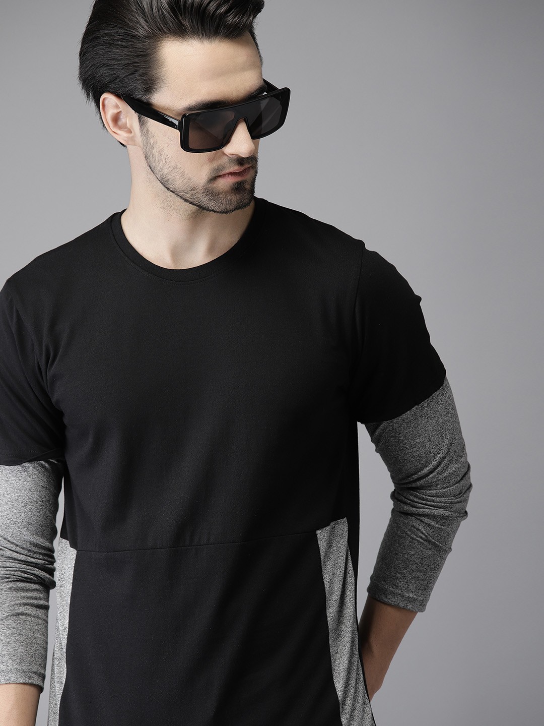 

Campus Sutra Men Black Solid Round Neck T-shirt