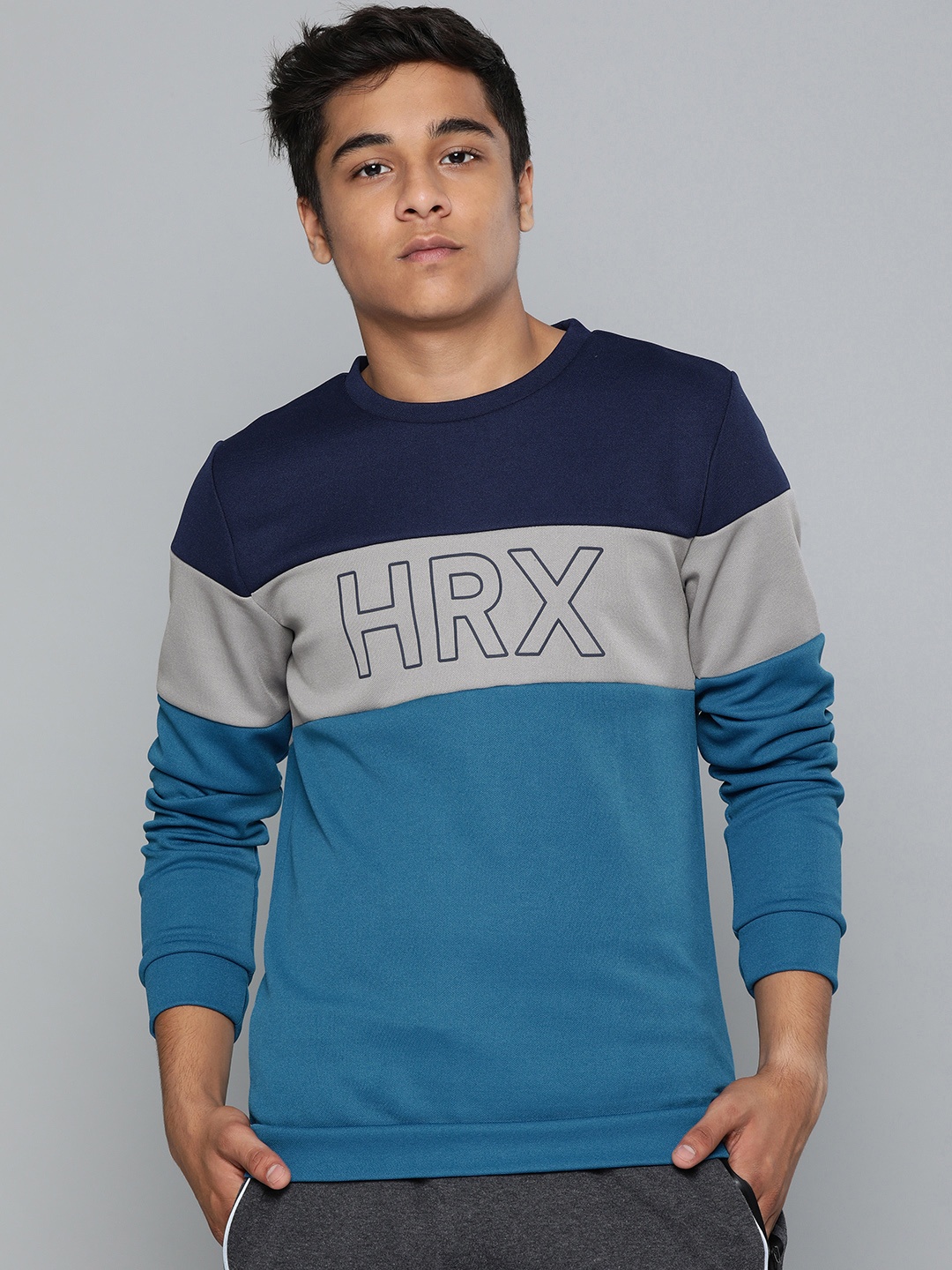 

HRX by Hrithik Roshan Boys Blue & Grey Colourblocked Active Training Sweatshirts