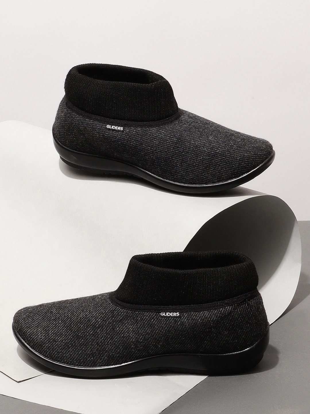 

Gliders Women Black Slip-On Sneakers
