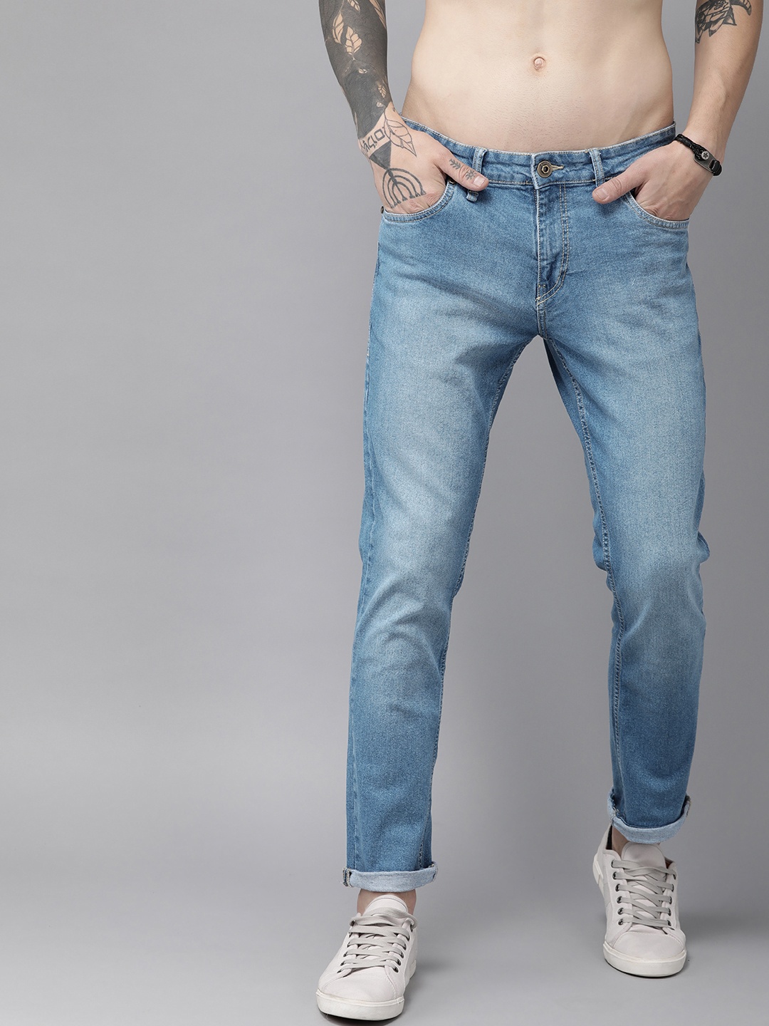 

The Roadster Lifestyle Co Men Blue Slim Tapered Fit Mid-Rise Clean Look Stretchable Jeans