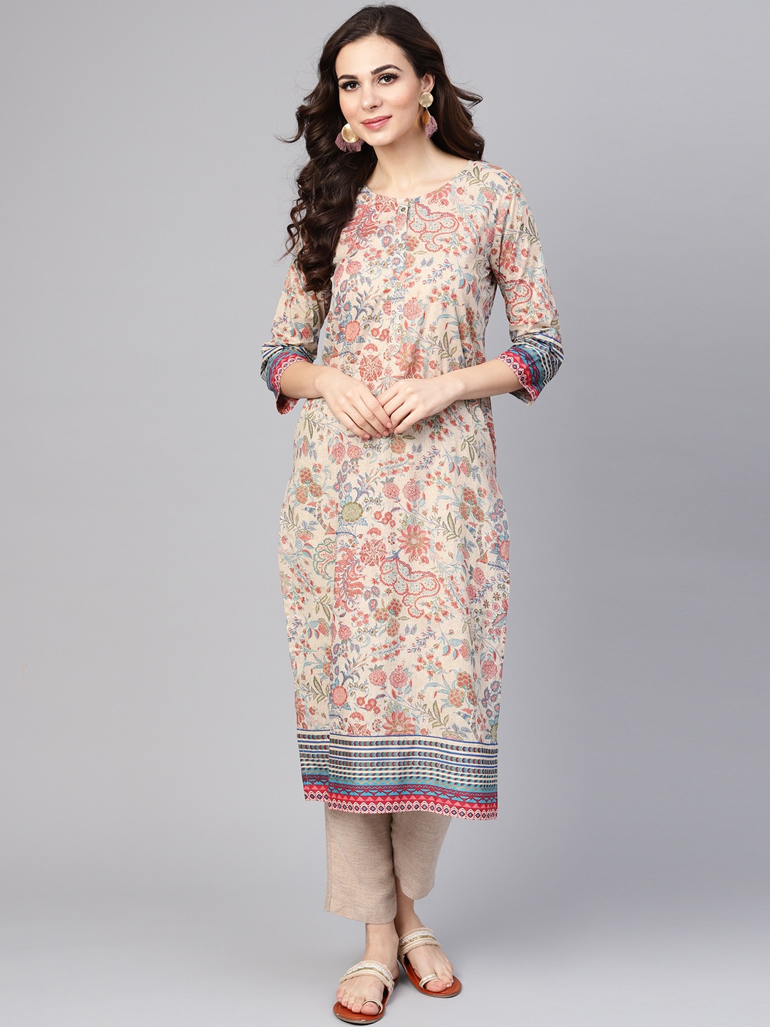 

Yuris Women Beige & Rust Red Floral Printed Straight Kurta