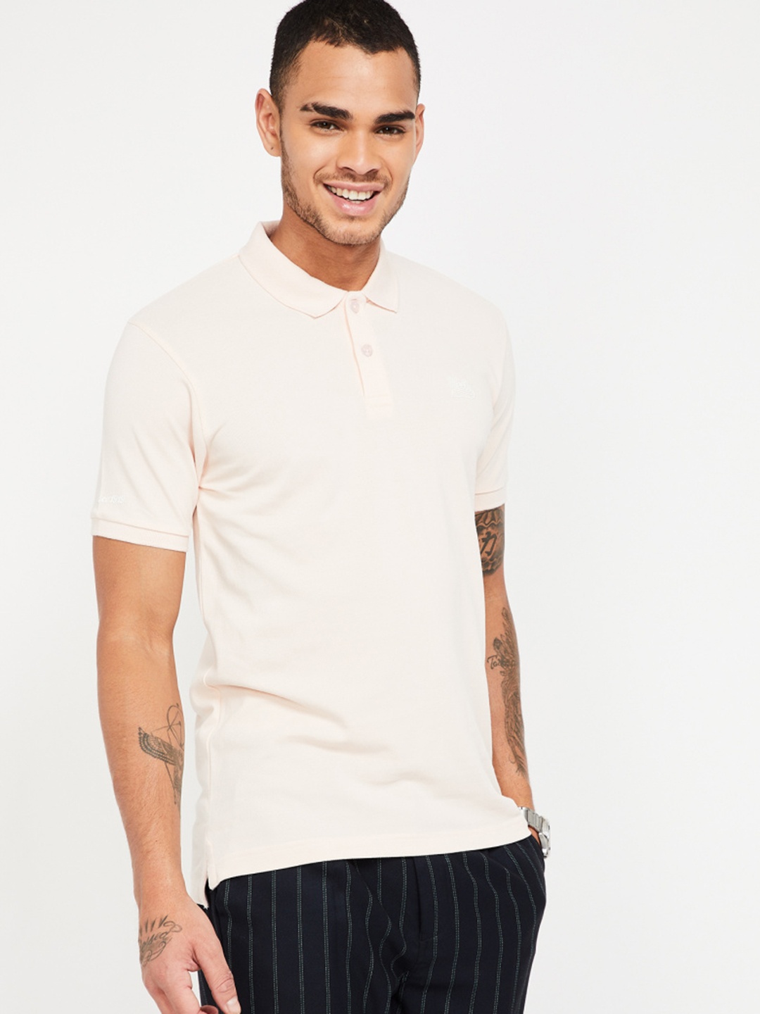 

UCLA Men Beige Solid Polo Collar T-shirt