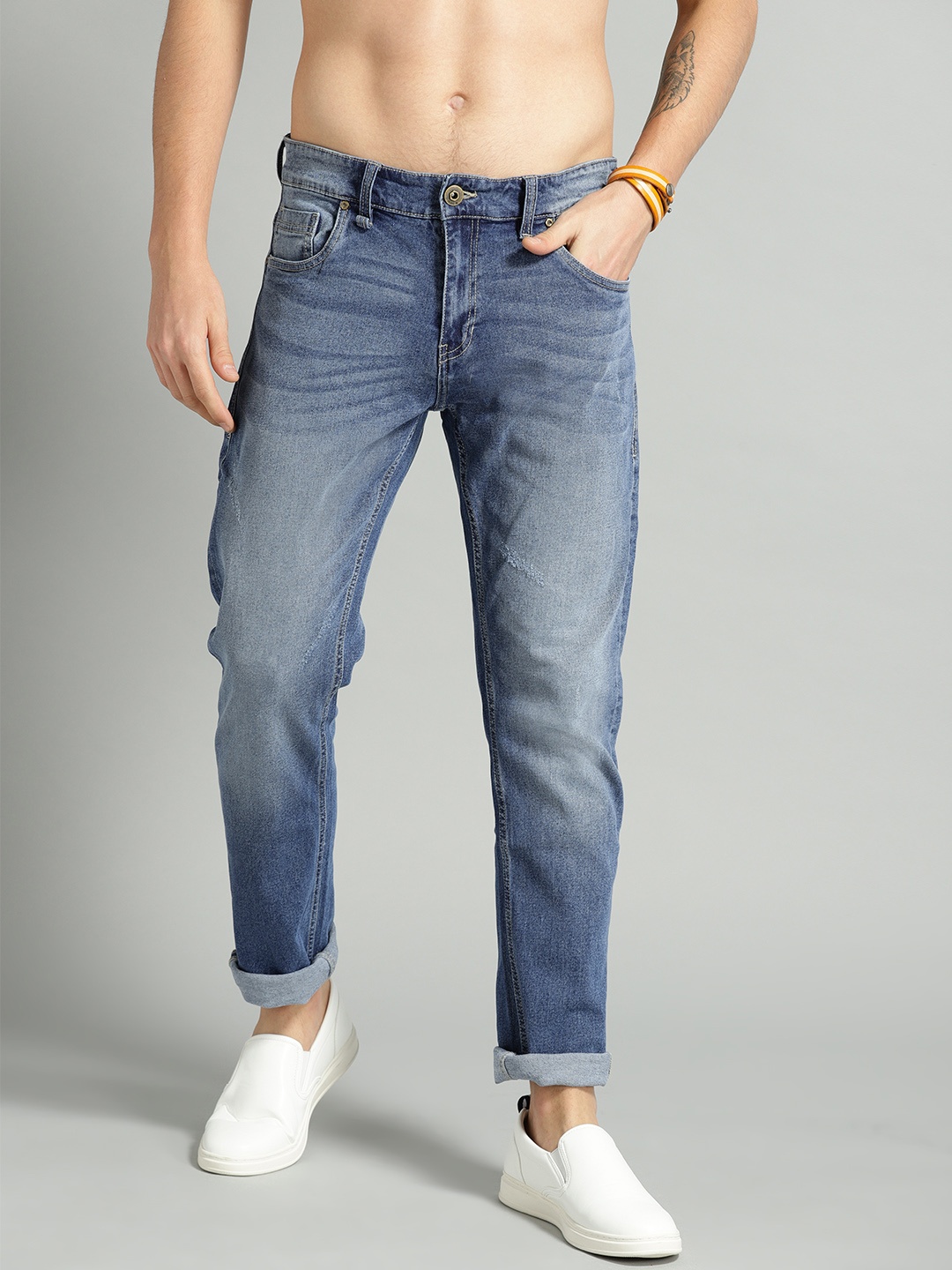 

The Roadster Lifestyle Co Men Blue Slim Fit Mid-Rise Clean Look Stretchable Jeans