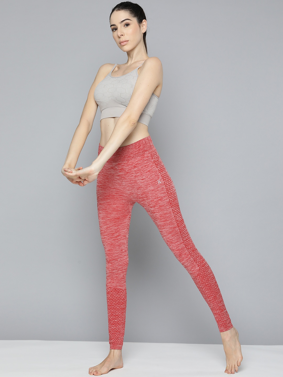 

HRX by Hrithik Roshan Women Red Melange Effect Rapid-Dry Seamless Yoga Tights