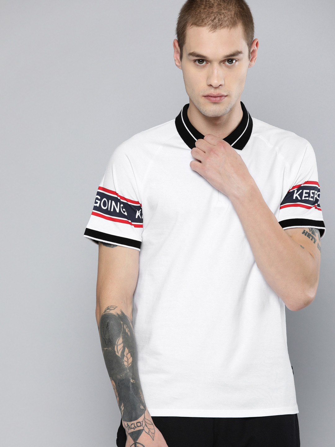 

HRX by Hrithik Roshan Men White Lifestyle Regular Fit Polo Collar Pure Cotton T-shirt