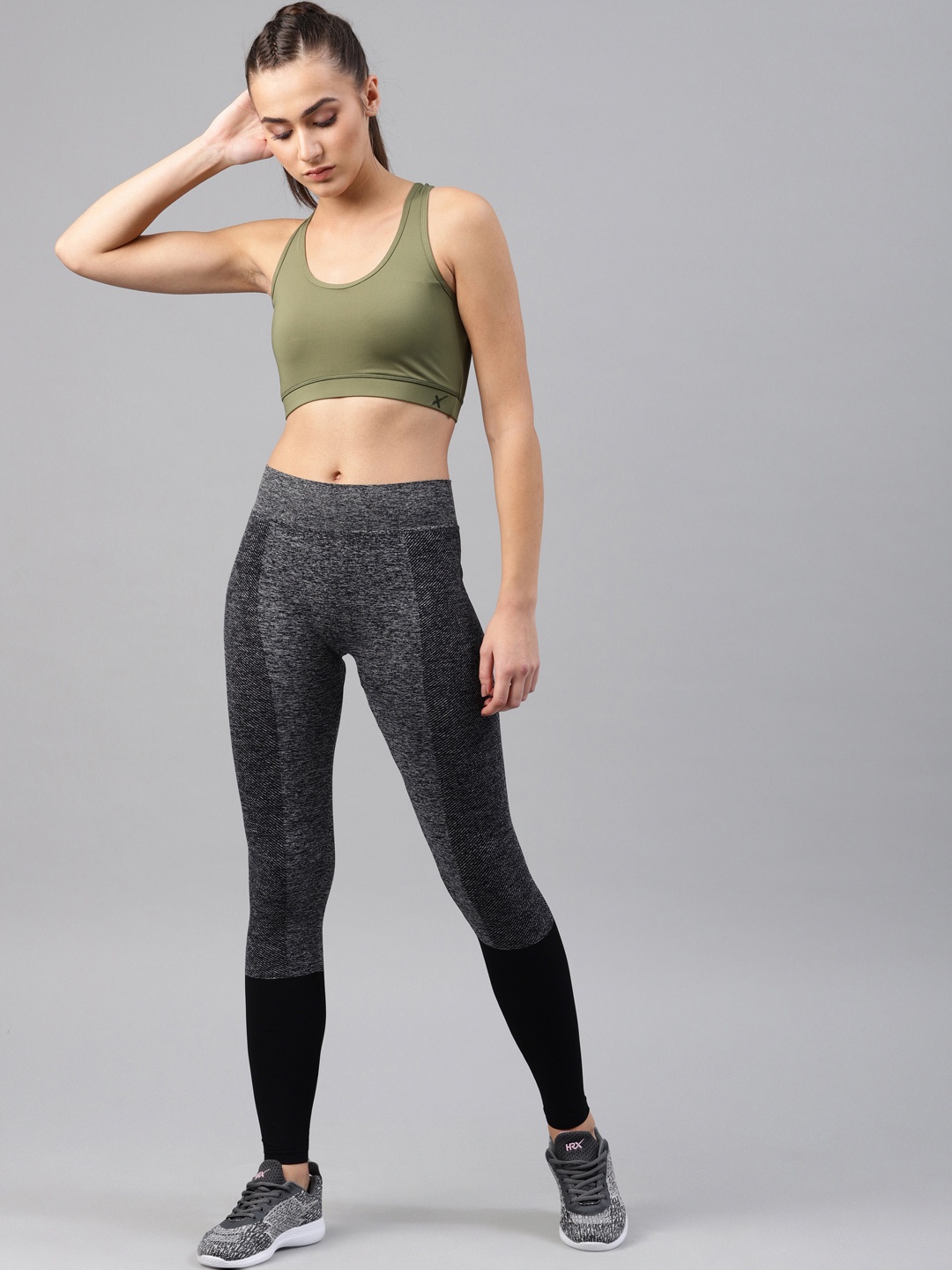 

HRX by Hrithik Roshan Women Black Self Design Rapid Dry Seamless Yoga Tights