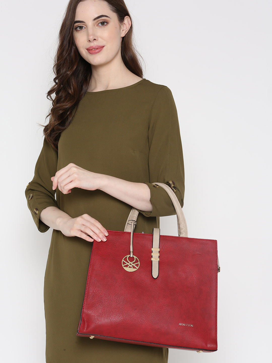 

United Colors of Benetton Maroon Solid Handheld Bag