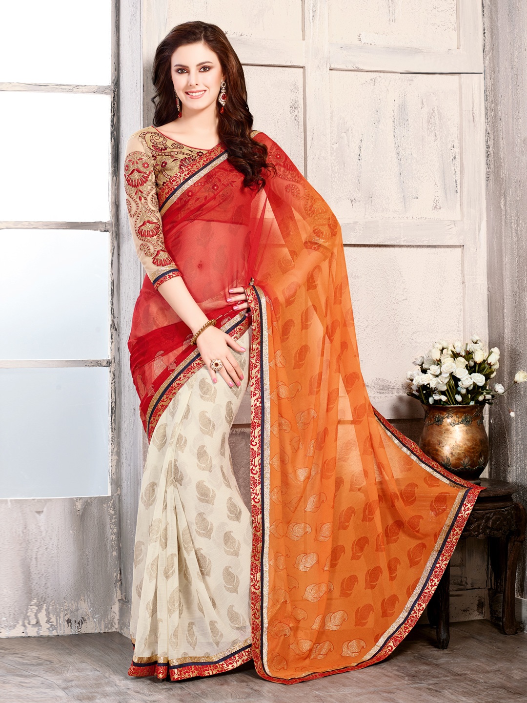 

Kalista Orange & Beige Georgette Embellished Saree