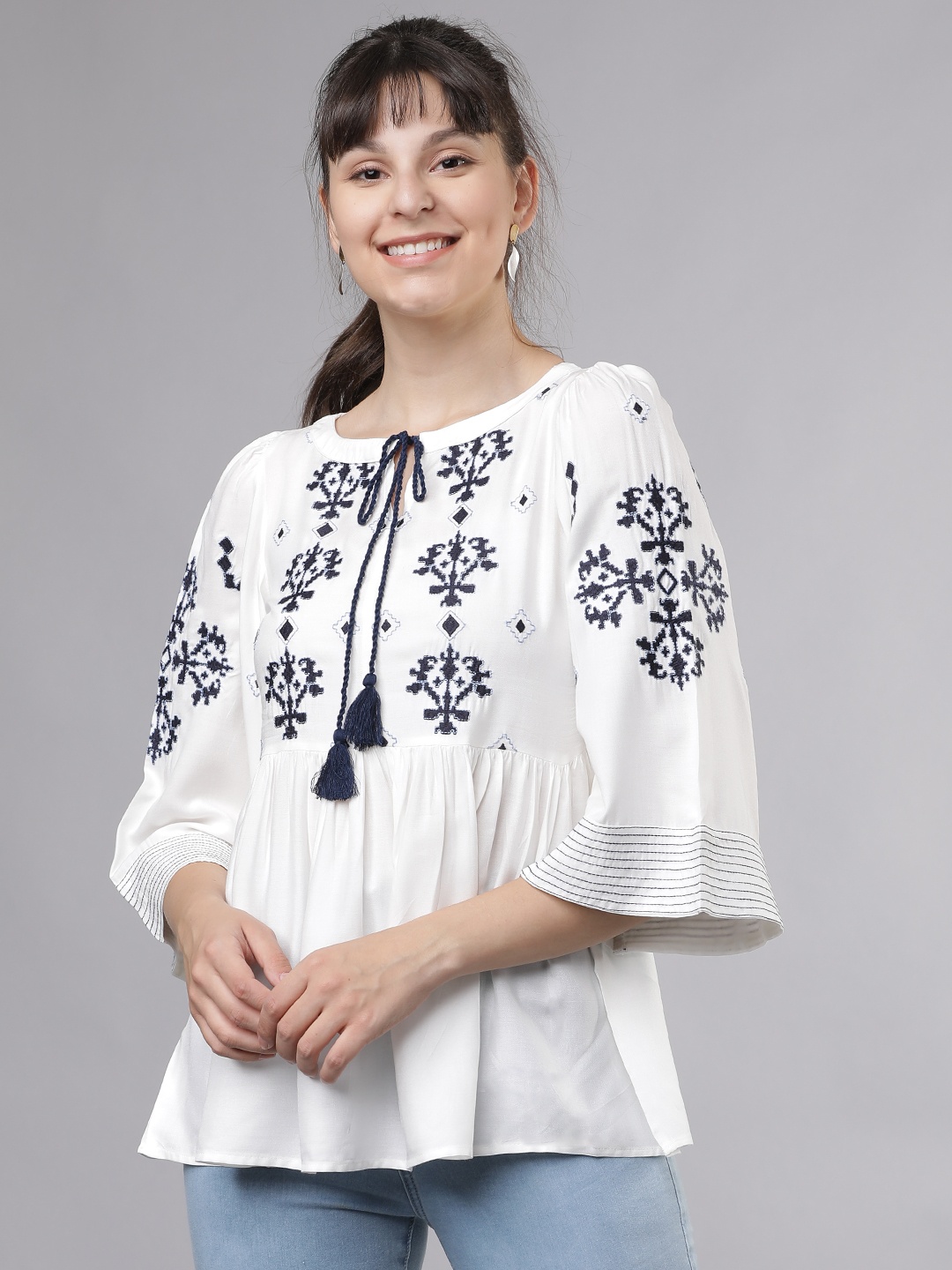 

Tokyo Talkies Women Off-White Printed Empire Top