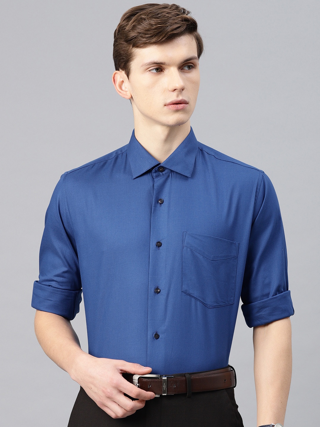 

Van Heusen Men Blue Slim Fit Solid Smart Casual Shirt
