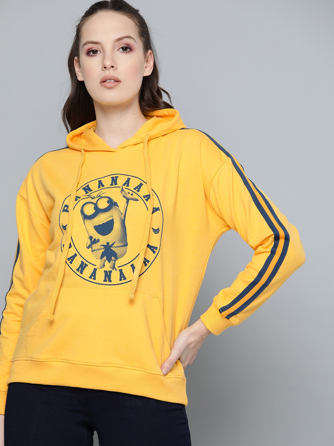 

Minions by Kook N Keech Women Yellow Printed Hooded Sweatshirt