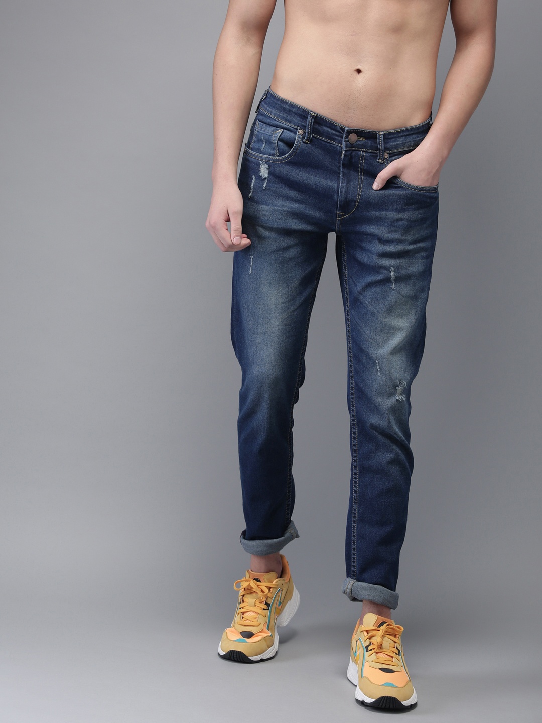 

HERE&NOW Men Blue Slim Fit Mid-Rise Low Distress Stretchable Jeans