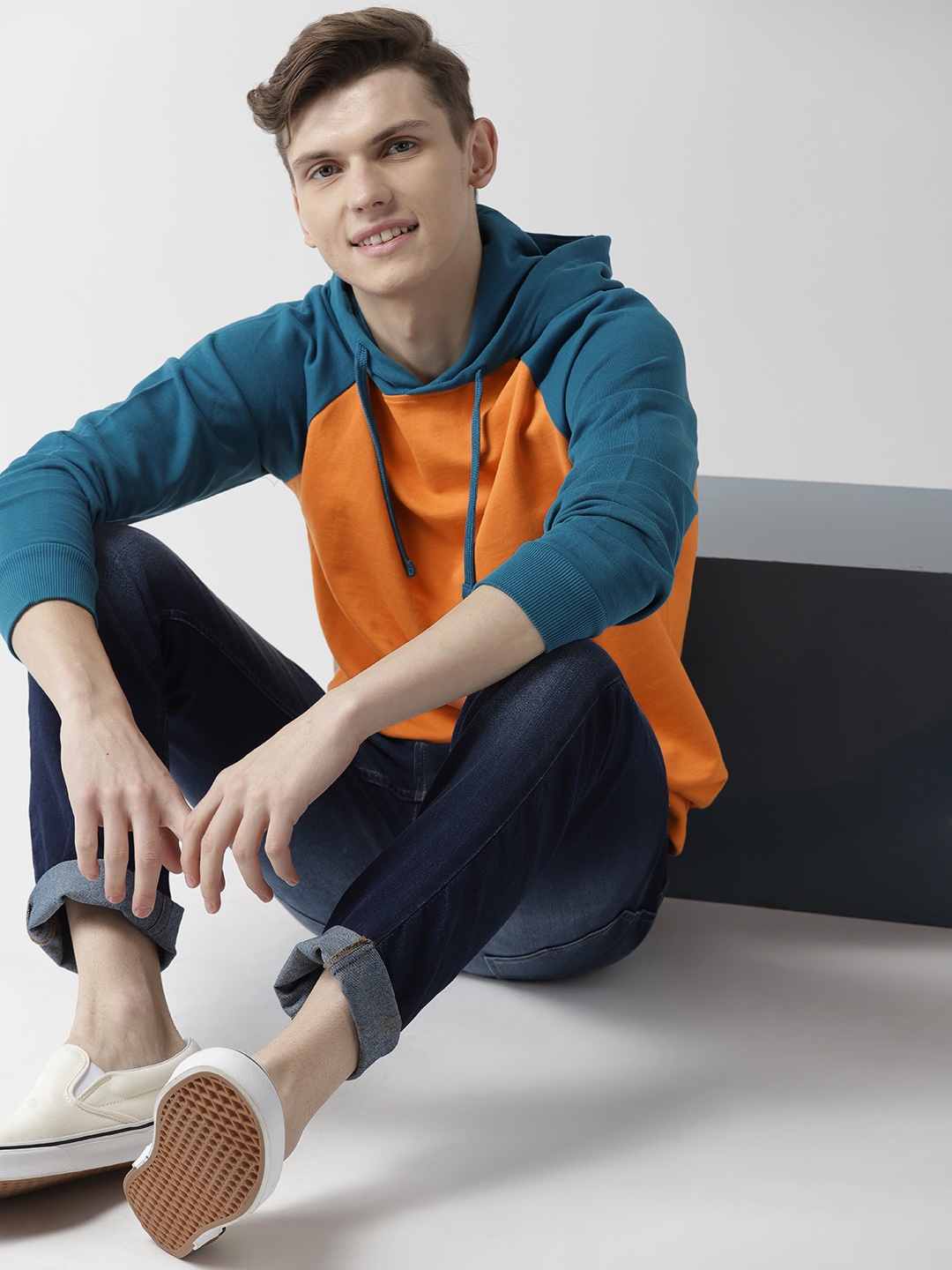 

Mast & Harbour Men Orange Solid Hooded Sweatshirt