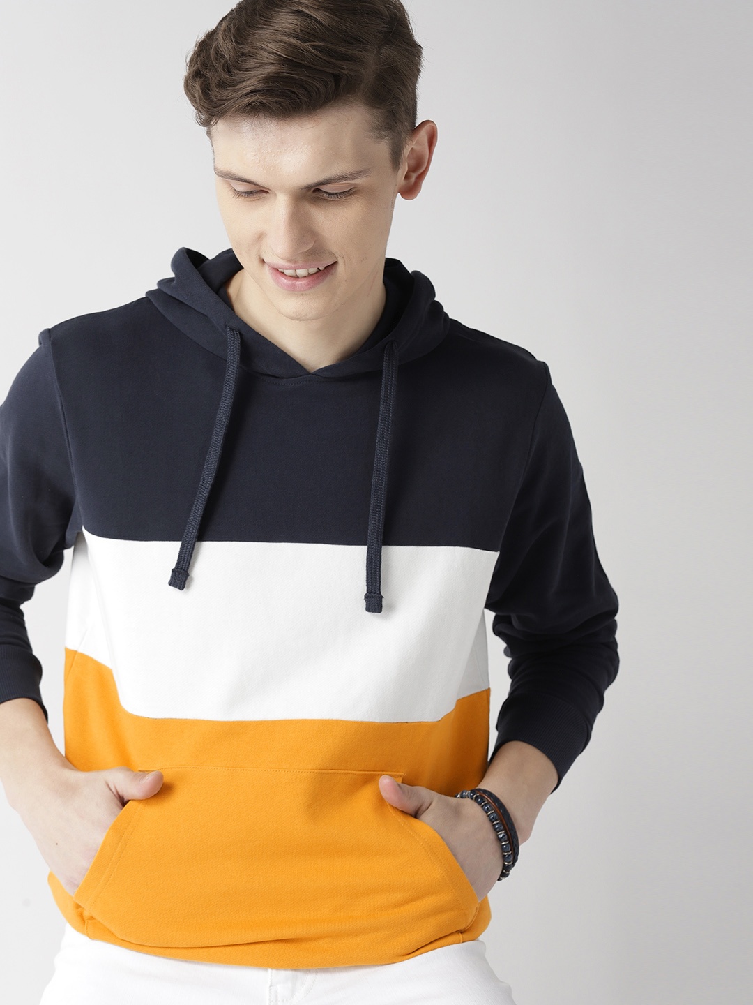 

Mast & Harbour Men Navy Blue & Mustard Yellow Colourblocked Hooded Sweatshirt