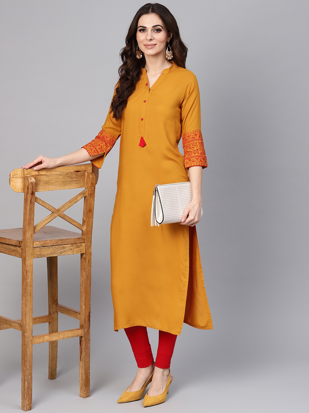 

Libas Women Mustard Yellow Solid Straight Kurta