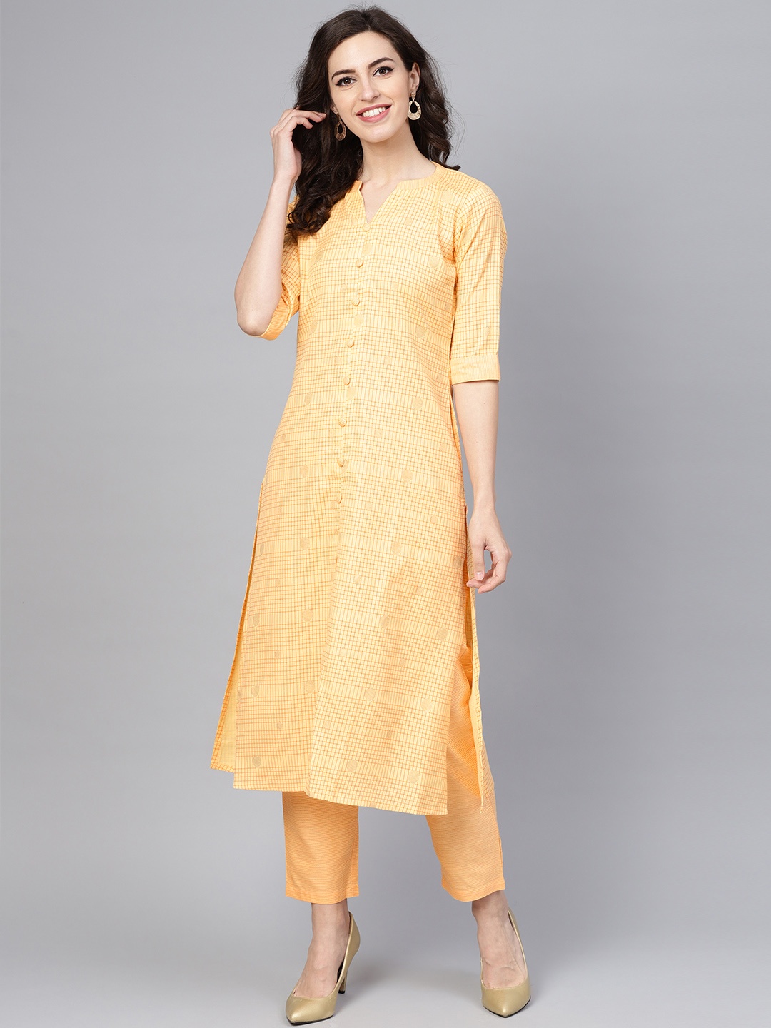 

Libas Women Yellow & Golden Checked Kurta with Trousers