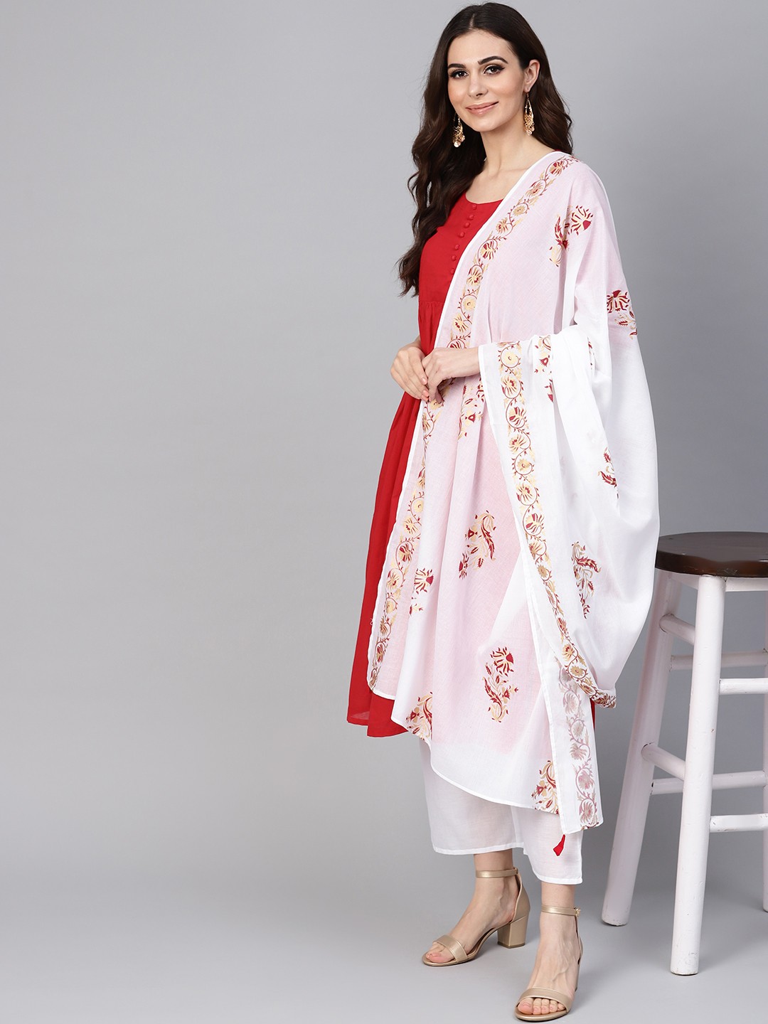 

Libas Women Red & White Solid Kurta with Trousers & Dupatta