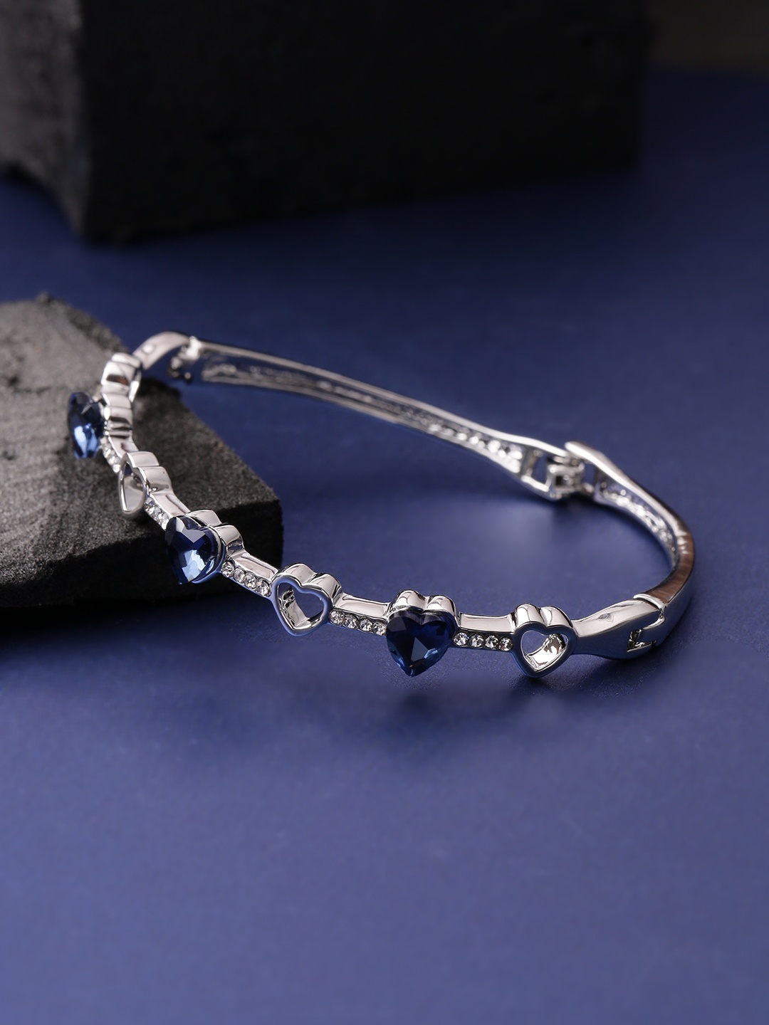 

Jewels Galaxy Navy Blue Silver-Plated Stone-Studded Bangle-Style Bracelet