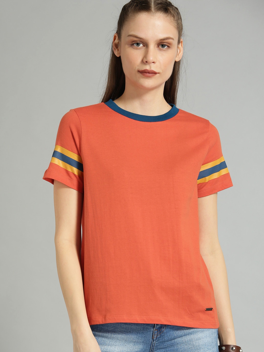 

Roadster Women Orange Solid Round Neck Pure Cotton T-shirt