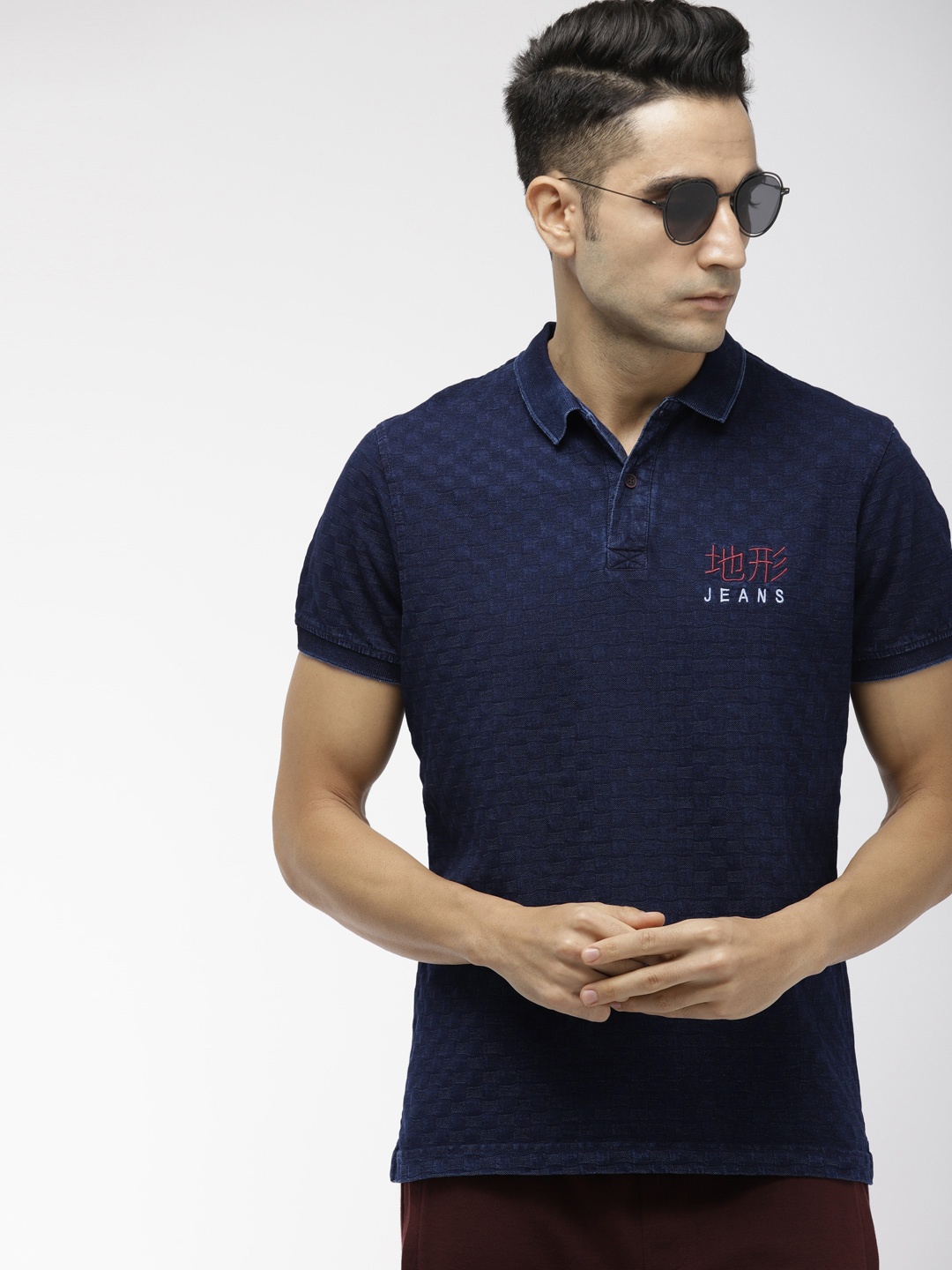 

Indian Terrain Men Navy Blue Self Design Polo Collar Pure Cotton T-shirt