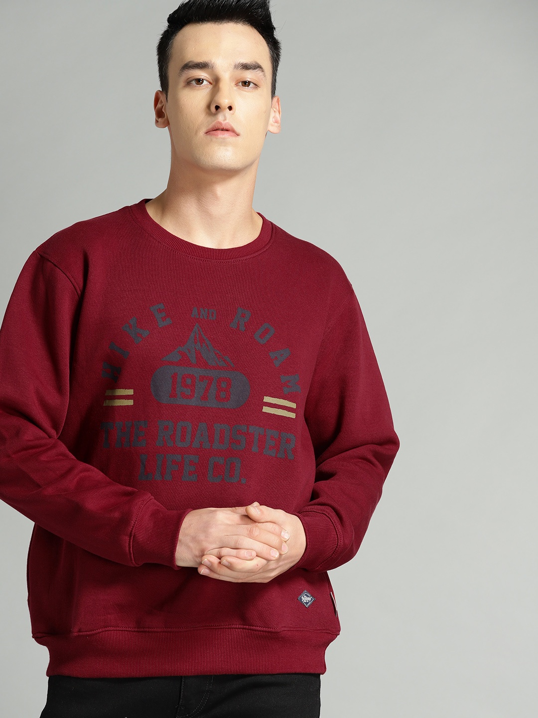 

The Roadster Lifestyle Co Men Maroon Printed Sweatshirt