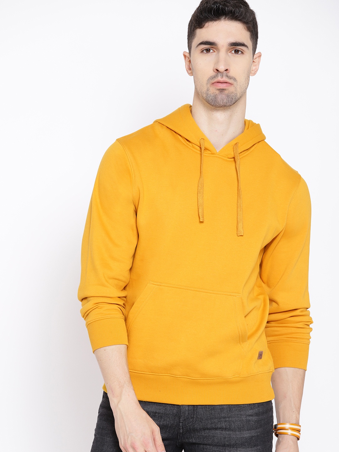 

The Roadster Lifestyle Co Men Mustard Yellow Solid Hooded Sweatshirt