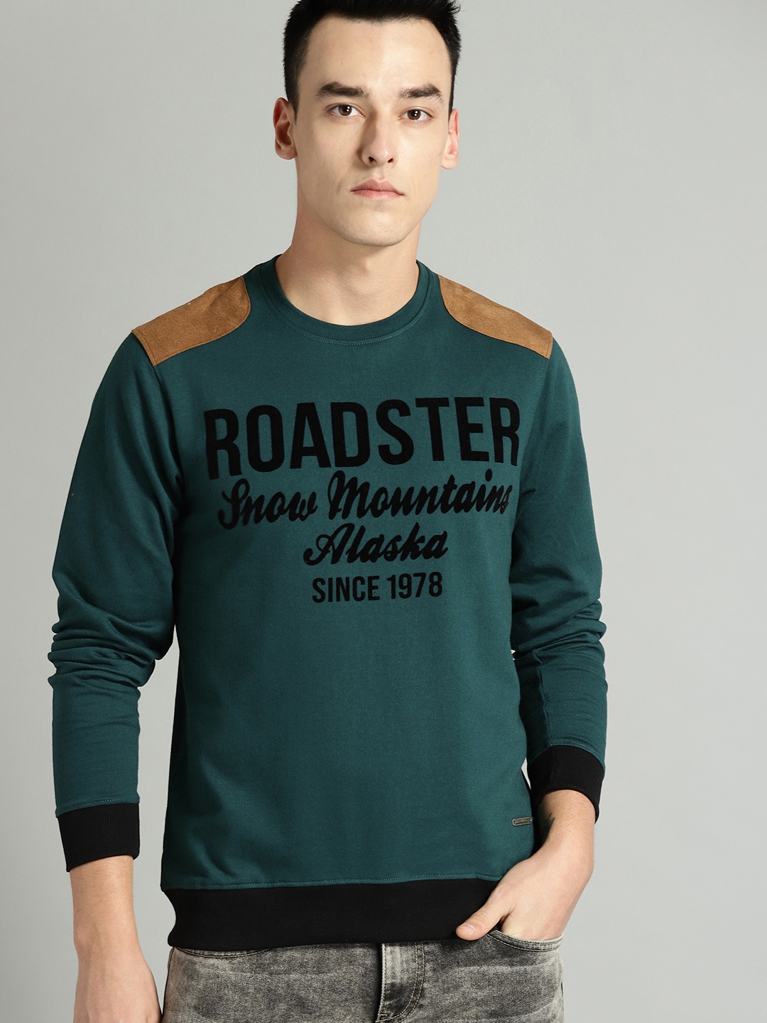 

The Roadster Lifestyle Co Men Green & Black Printed Sweatshirt