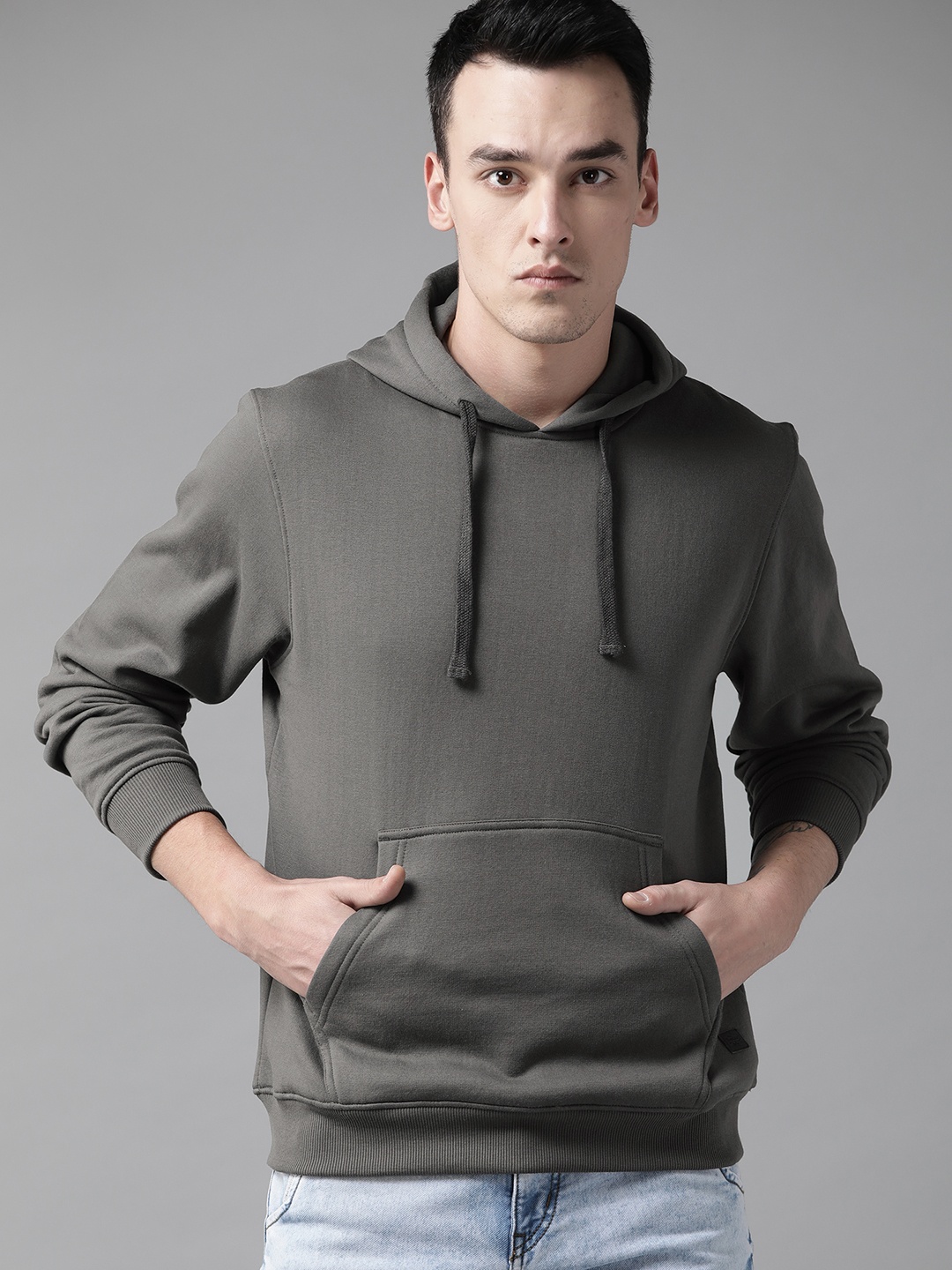 

The Roadster Lifestyle Co Men Charcoal Grey Solid Hooded Sweatshirt