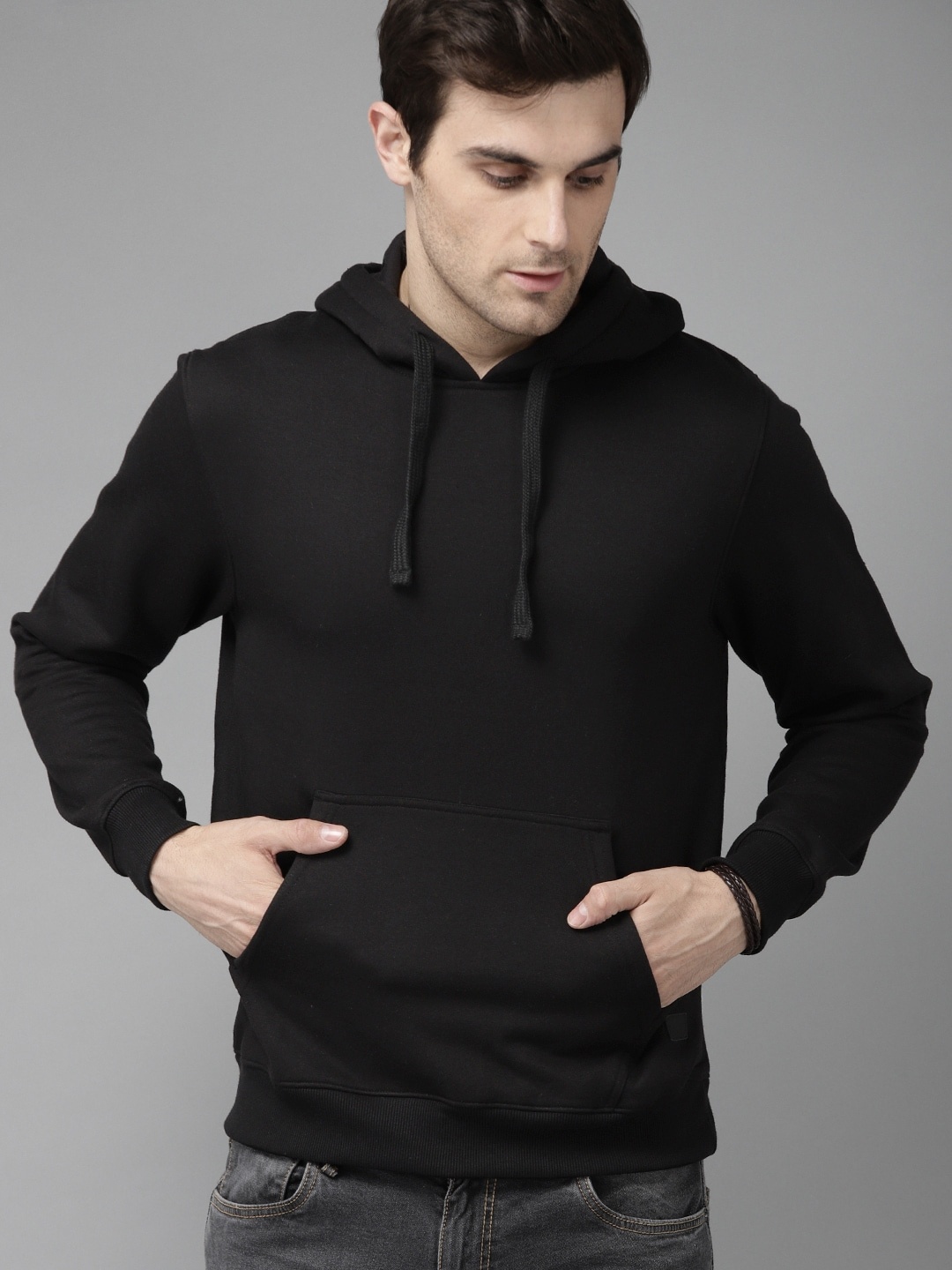 

The Roadster Lifestyle Co Men Black Solid Hooded Sweatshirt