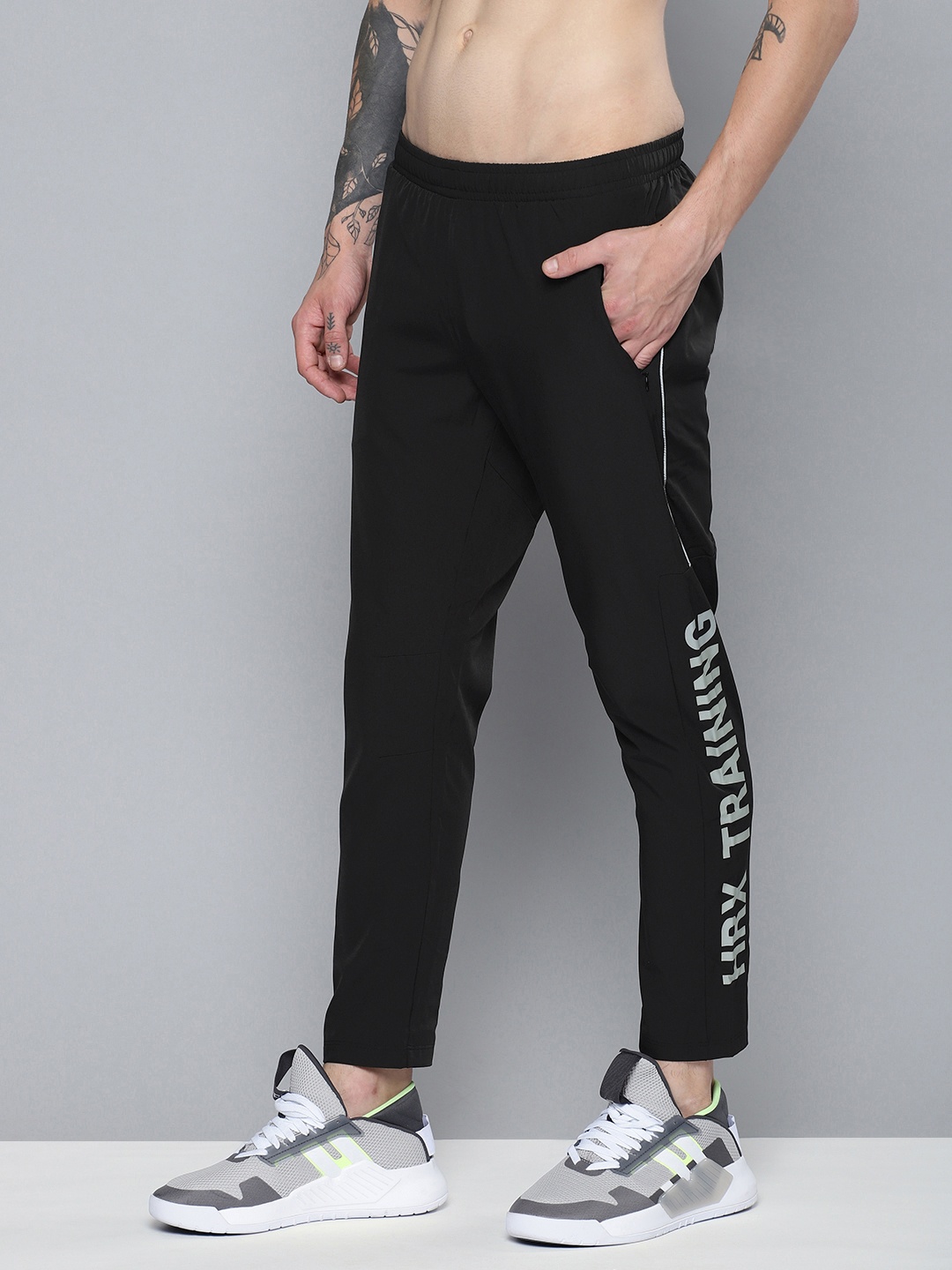 

HRX by Hrithik Roshan Men Black Solid RAPID-DRY Training Slim Fit Track Pants
