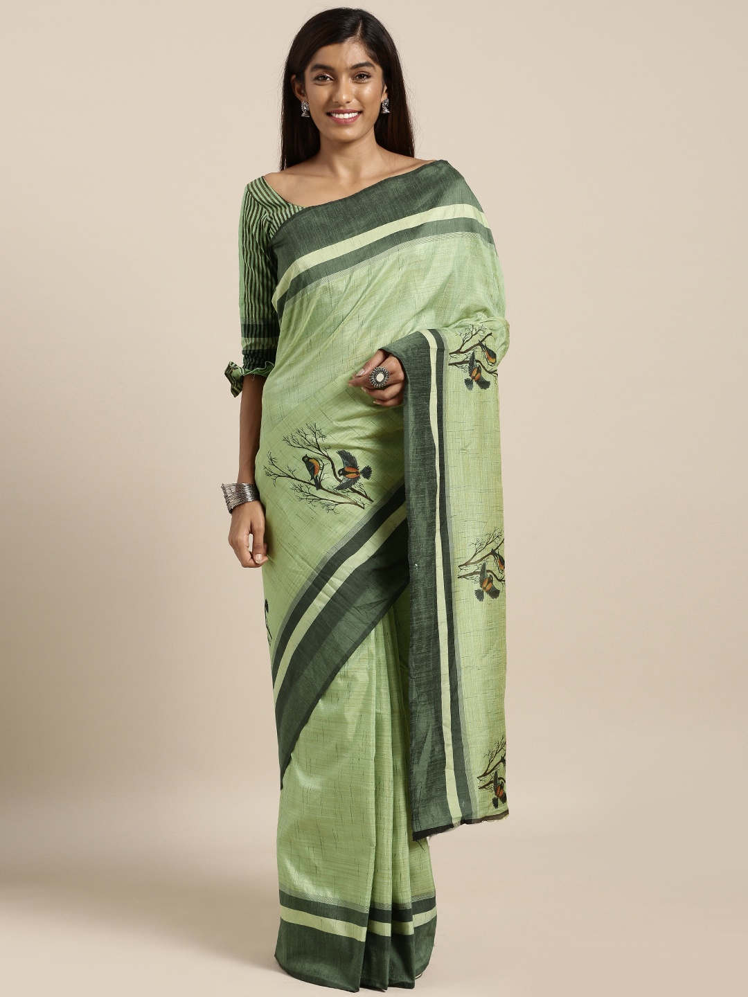 

Kvsfab Women Green Printed Cotton Blend Saree