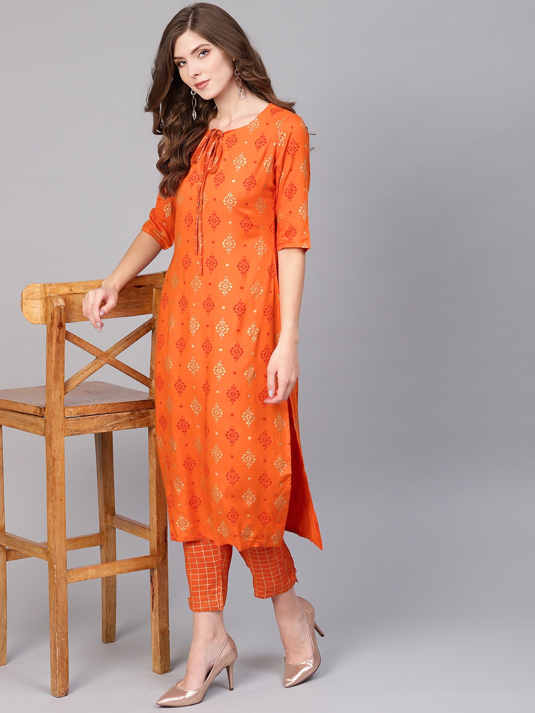 

Gerua By Libas Women Rust Orange Golden Block Print Kurta with Trousers