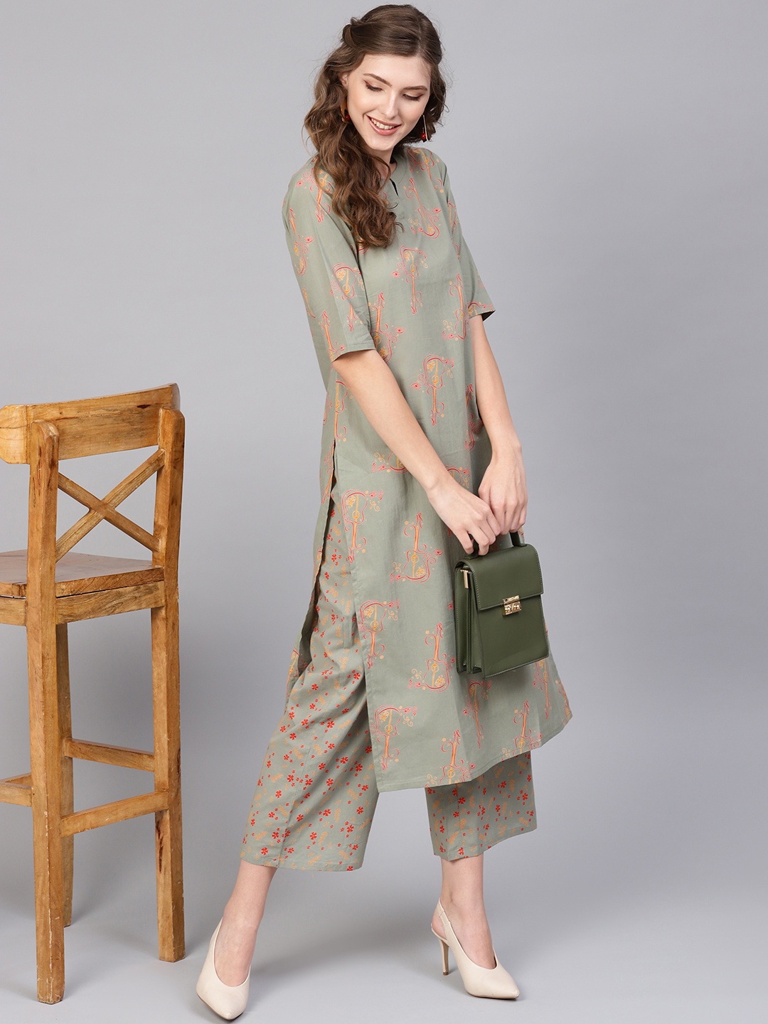 

Gerua By Libas Women Green Red Printed Kurta with Palazzos