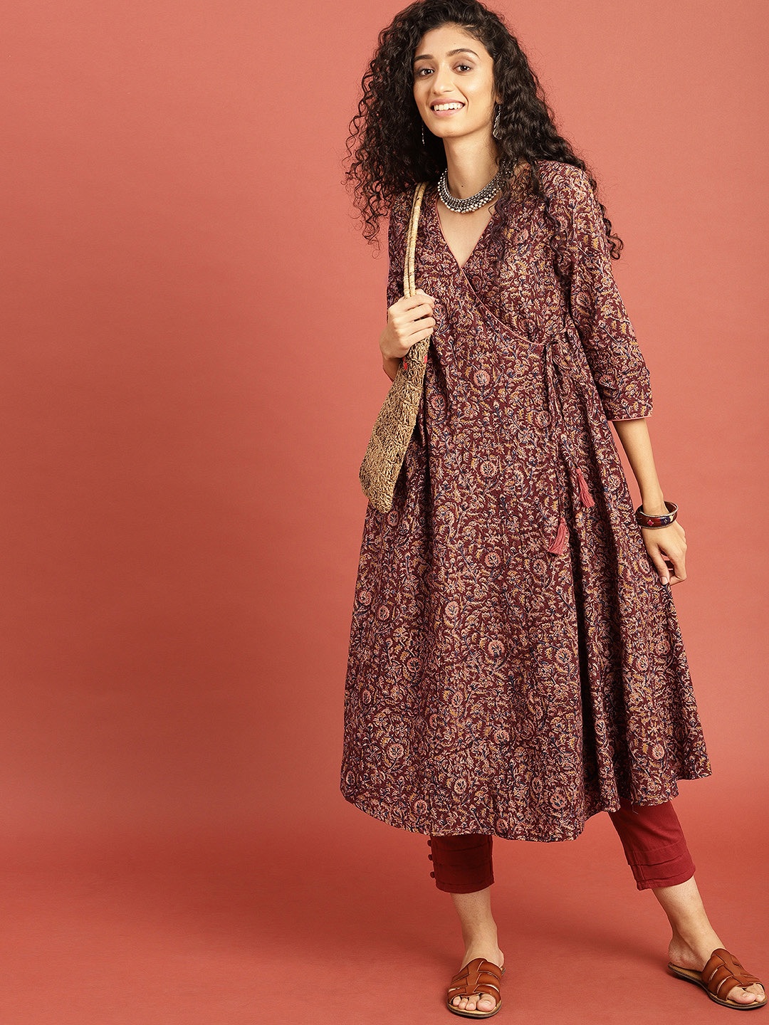 

Taavi Women Rust Brown Kalamkari Hand Block Printed A-Line Angrakha Kurta with Tie-Ups