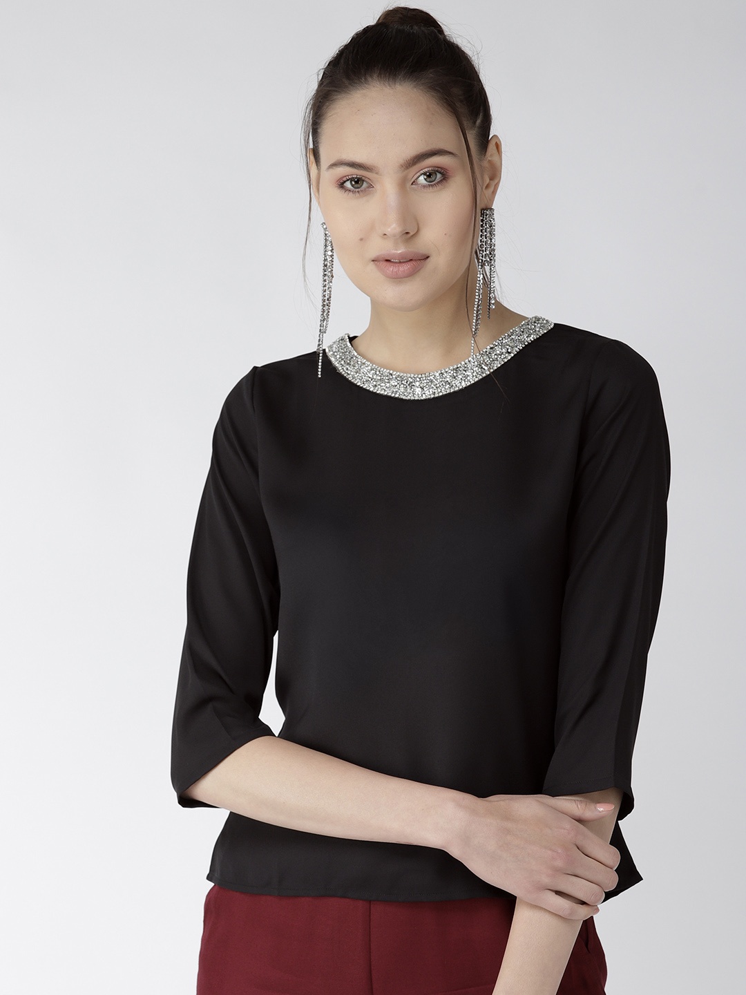 

Style Quotient Women Black Solid Top