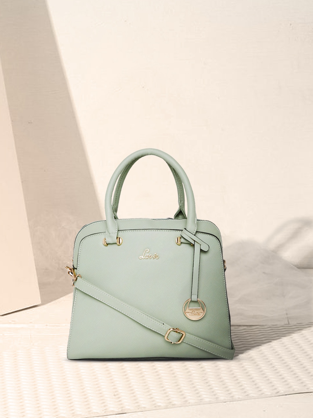 

Lavie Ushawu Women Green Solid Medium Handheld Bag