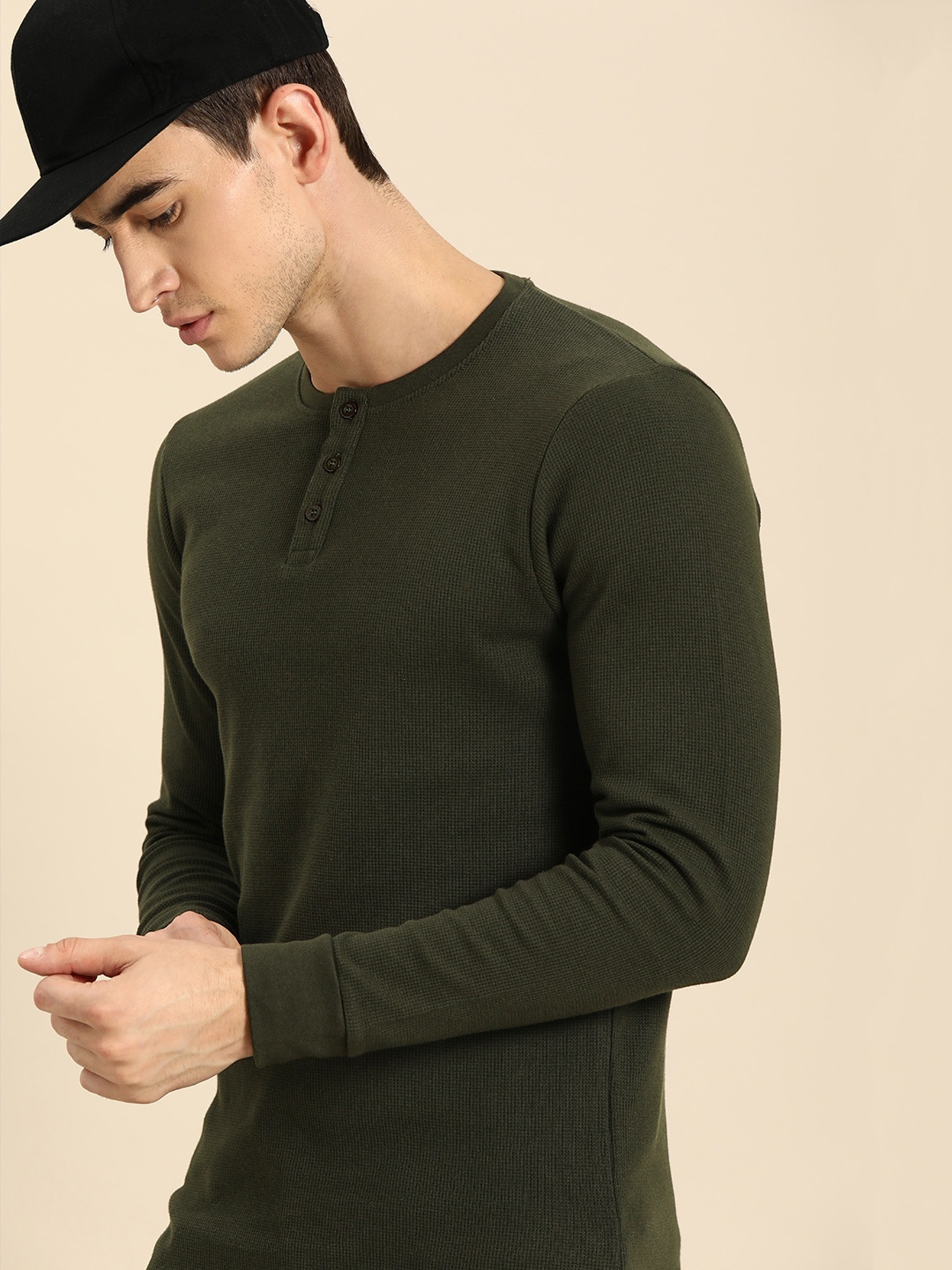 

ether Men Olive Green Self Design Sweatshirt