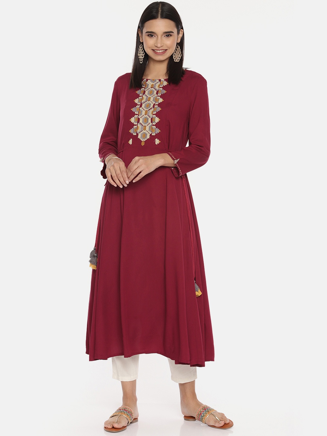 

Global Desi Women Burgundy Solid Anarkali Kurta with Embroidery Detail