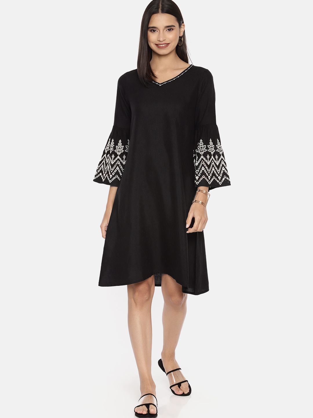 

Global Desi Women Black Solid Sheath Dress with Embroidery Detail