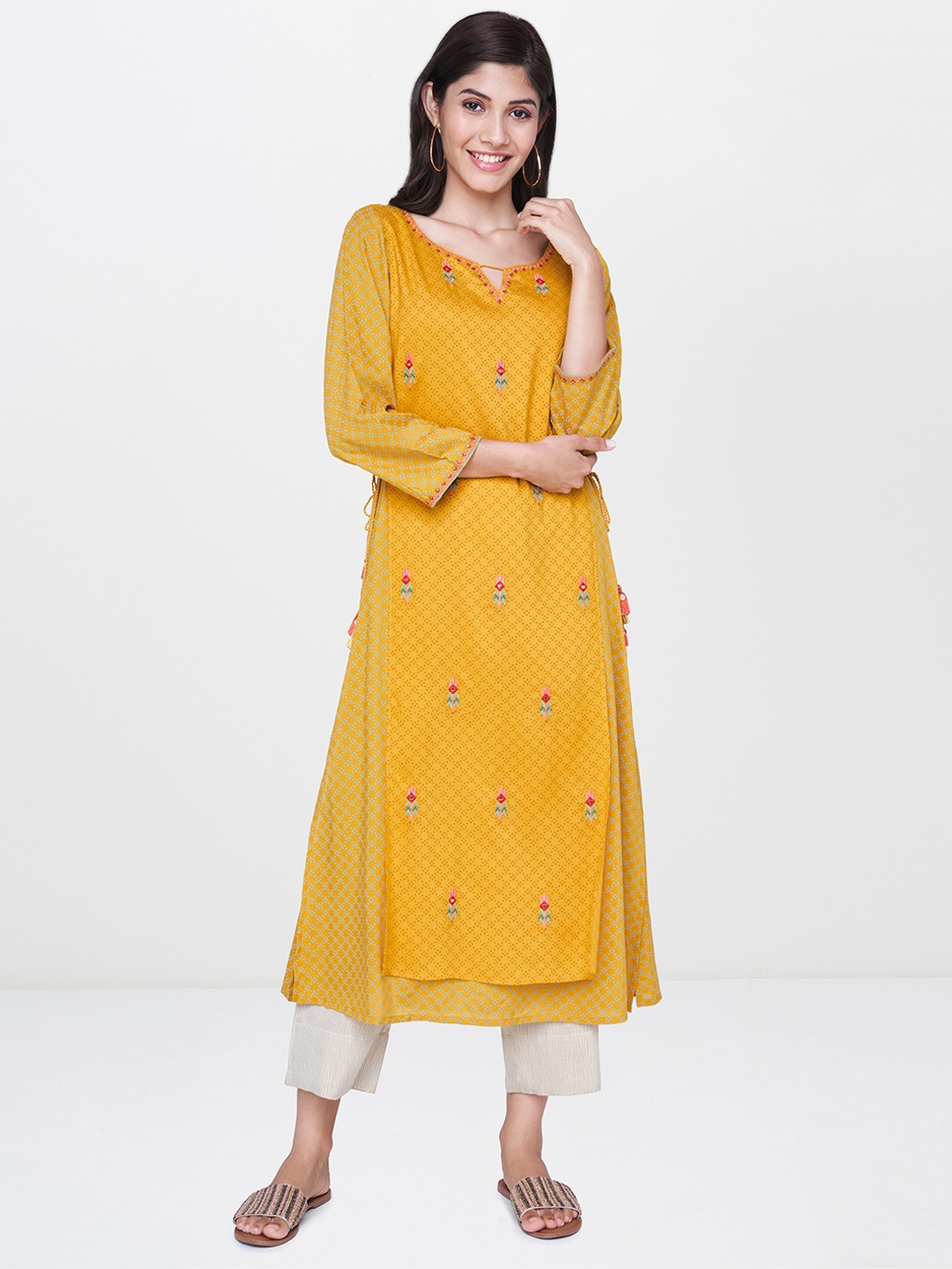 

Global Desi Women Mustard Yellow Floral Printed A-Line Kurta