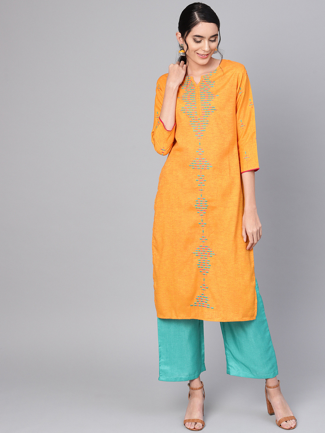 

Indo Era Women Orange Embroidered Straight Kurta