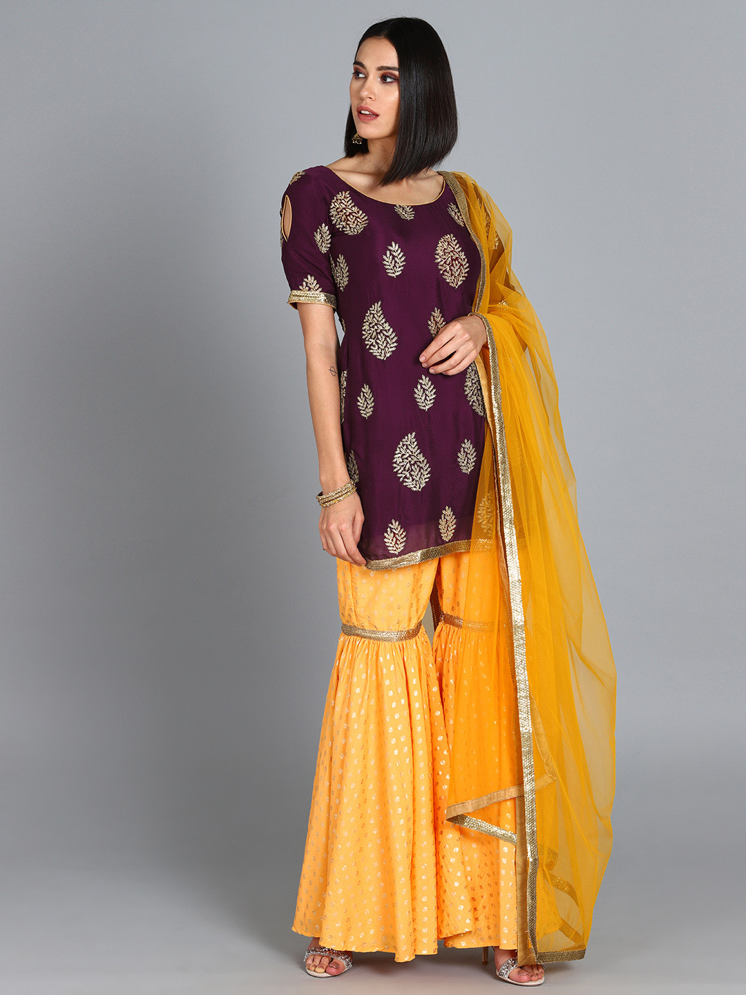 

Ethnovog Women Purple Yellow Embroidered Kurti with Sharara Dupatta