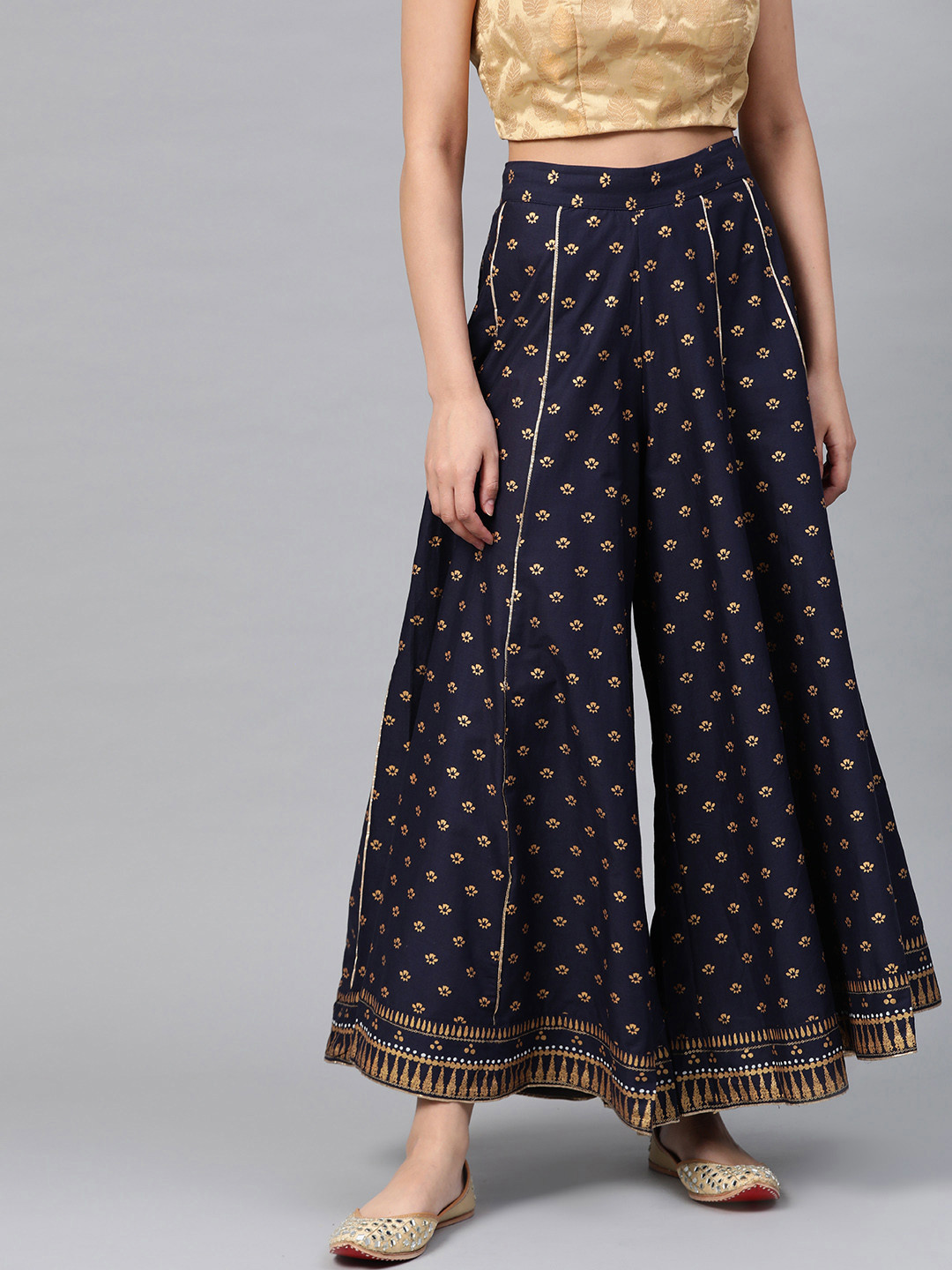 

W Women Navy Blue & Golden Printed Flared Palazzos