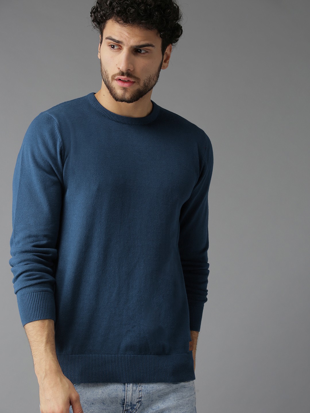 

Roadster Men Navy Blue Solid Sweater